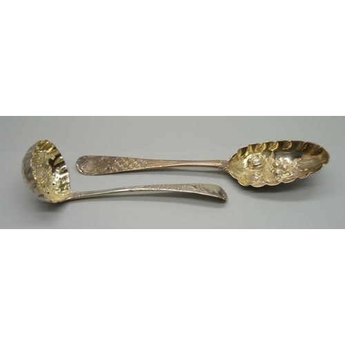 879 - Four George II silver berry spoons and a later silver sugar sprinkler, London 1742-1743, 255g