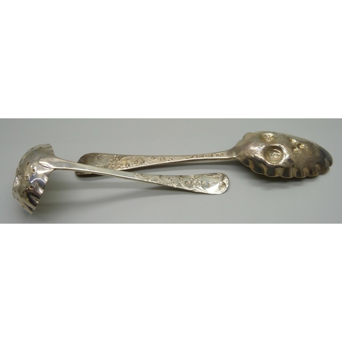 879 - Four George II silver berry spoons and a later silver sugar sprinkler, London 1742-1743, 255g