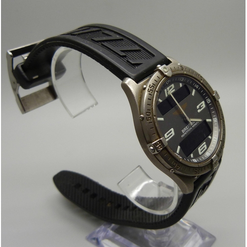 883 - A gentleman's Breitling Aerospace analogue and digital wristwatch, E65062-18039, with box and papers