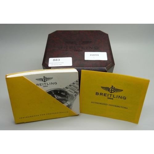 883 - A gentleman's Breitling Aerospace analogue and digital wristwatch, E65062-18039, with box and papers