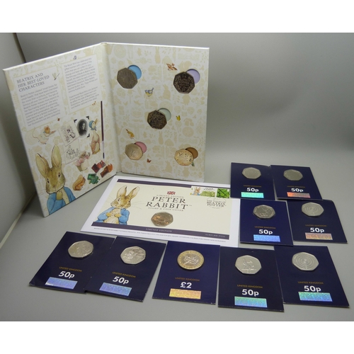 884 - A collection of 50p coins, VE Day, Beatrix Potter including four coin covers and three Royal Mint, e... 