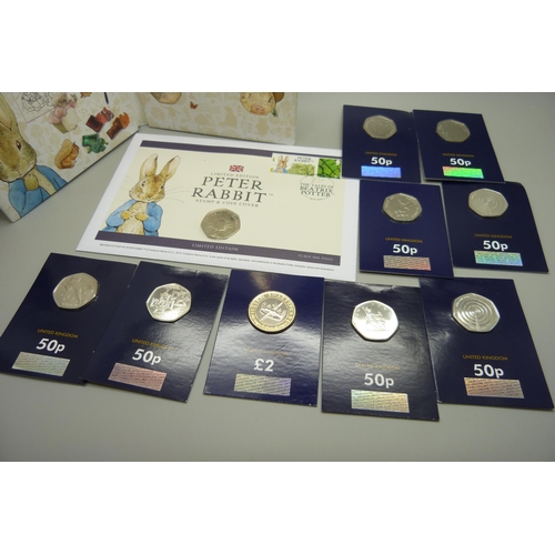 884 - A collection of 50p coins, VE Day, Beatrix Potter including four coin covers and three Royal Mint, e... 