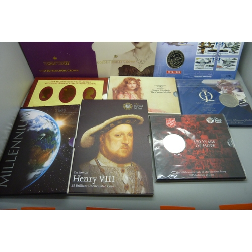 885 - Eight commemorative £5 coin packs, including RAF, Henry VIII and Millennium