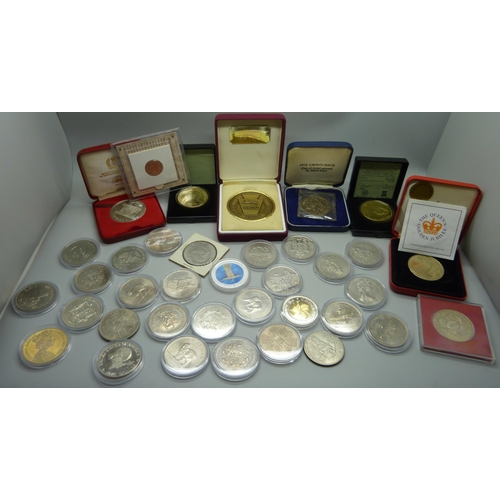 887 - A collection of commemorative coins and medals, lucky Irish penny, Isle of Man, Libera coins, etc.