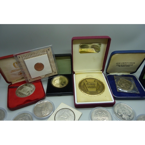 887 - A collection of commemorative coins and medals, lucky Irish penny, Isle of Man, Libera coins, etc.