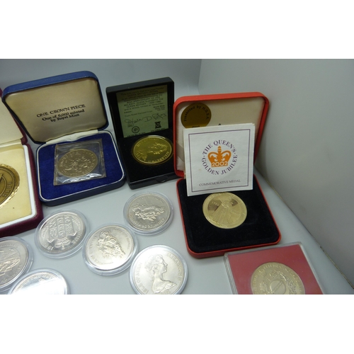 887 - A collection of commemorative coins and medals, lucky Irish penny, Isle of Man, Libera coins, etc.