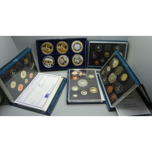 890 - Six boxes of commemorative coins including Sapphire Coronation, 1995 coin set, 1996 coin set, etc.