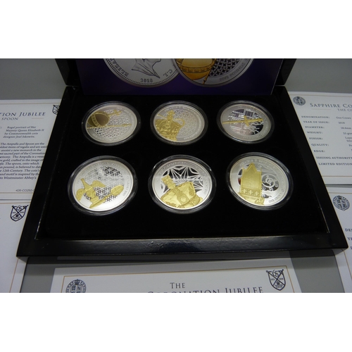 890 - Six boxes of commemorative coins including Sapphire Coronation, 1995 coin set, 1996 coin set, etc.