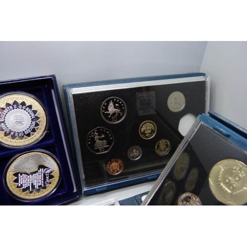 890 - Six boxes of commemorative coins including Sapphire Coronation, 1995 coin set, 1996 coin set, etc.