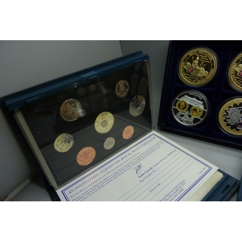 890 - Six boxes of commemorative coins including Sapphire Coronation, 1995 coin set, 1996 coin set, etc.