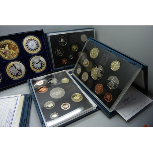 890 - Six boxes of commemorative coins including Sapphire Coronation, 1995 coin set, 1996 coin set, etc.