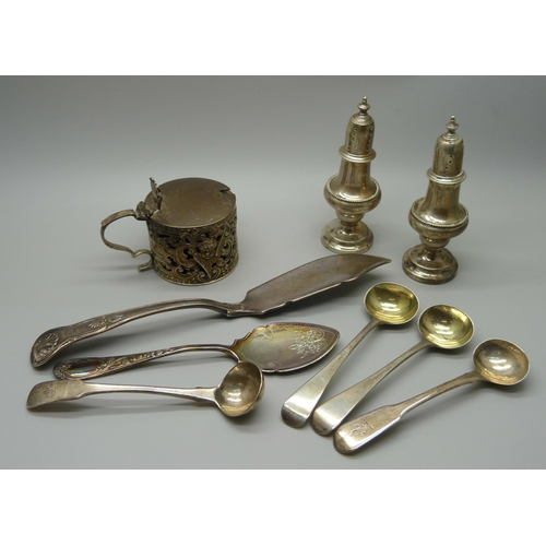 901 - A silver mustard, four silver mustard spoons, two silver servers and a pair of silver peppers, 353g