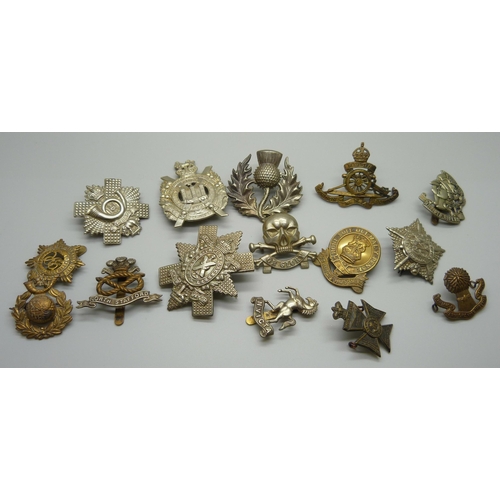 906 - Fifteen assorted cap badges