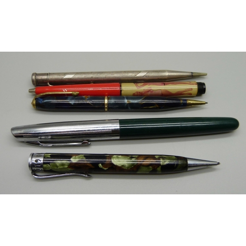 910 - A marbled 1935 Jubilee pencil, one other marbled pencil, a sterling silver Yard-O-Led propelling pen... 