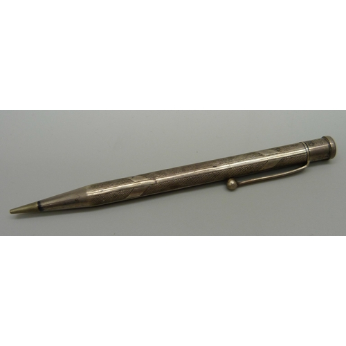 910 - A marbled 1935 Jubilee pencil, one other marbled pencil, a sterling silver Yard-O-Led propelling pen... 