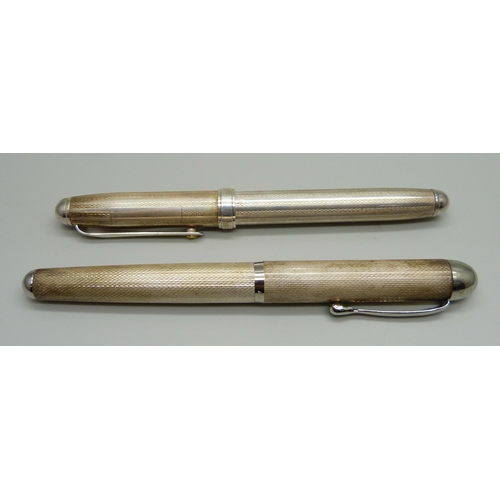 911 - Two silver fountain pens; Silver Star and Acier