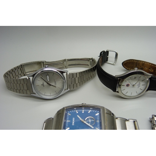 912 - A collection of six gentleman's wristwatches including Rotary, Lorus, Armani, etc.