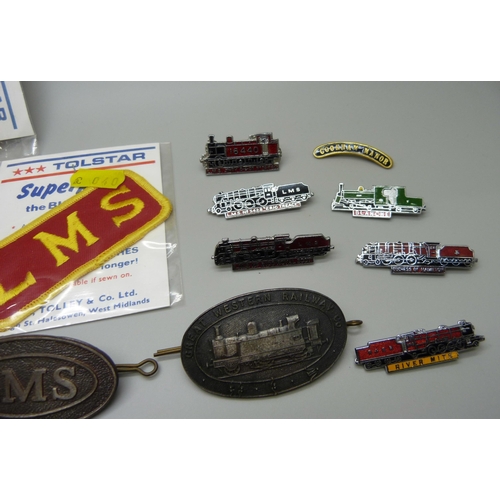 920 - A collection of railway badges including cap badges and five patches