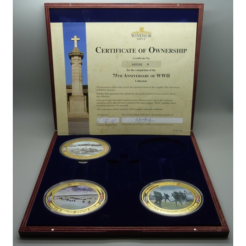 922 - Seven Windsor Mint D-Day commemorative medallions, in two cases