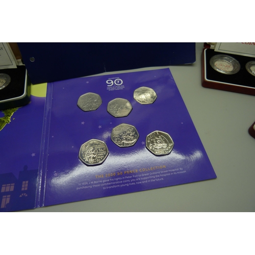 927 - A 2020 Peter Pan 50 pence collection, two Royal Mint 1973 50p coins, a 1990 silver Piedfort 5p coin ... 