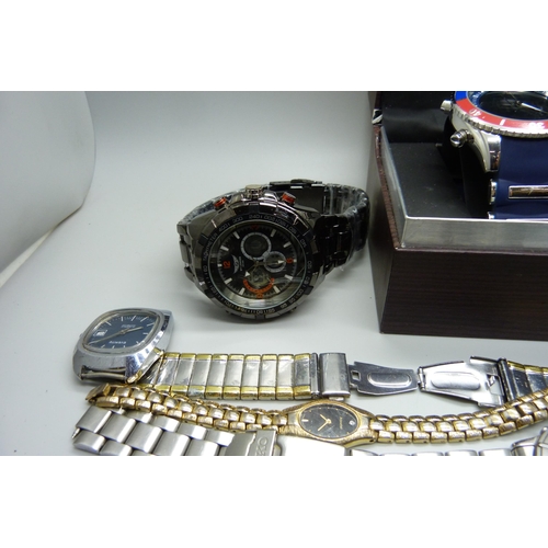 933 - A collection of wristwatches including Seiko chronograph, one other Seiko, Rotary, NY London, etc.