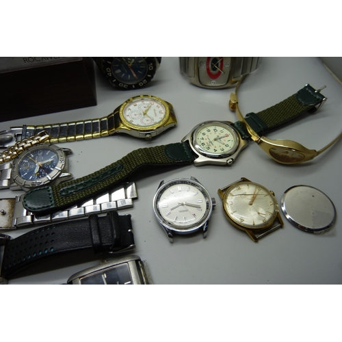 933 - A collection of wristwatches including Seiko chronograph, one other Seiko, Rotary, NY London, etc.