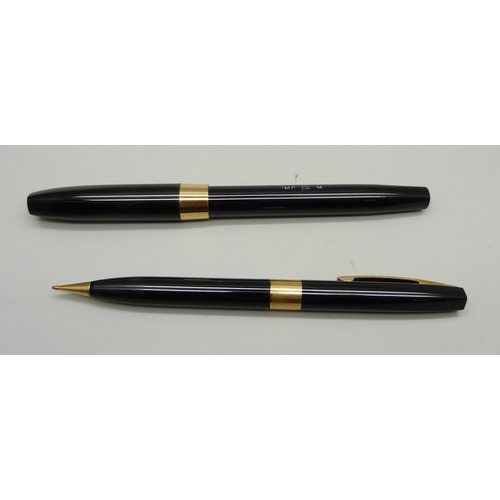 935 - A cased Sheaffer fountain pen and pencil set, Touchdown filling pen with 14ct gold nib