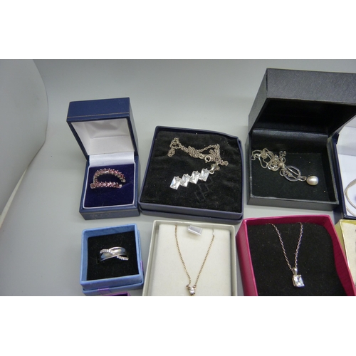 936 - A collection of silver jewellery, pendants, earrings and a ring