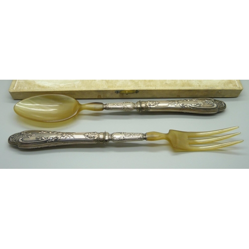 937 - French white metal and celluloid salad servers