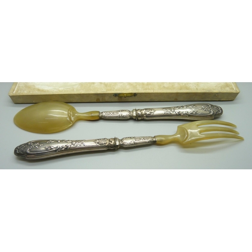 937 - French white metal and celluloid salad servers