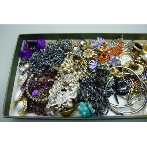 945 - A collection of costume earrings, etc.