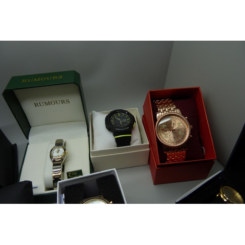 955 - A collection of fashion wristwatches including Ben Sherman, Pierre Cardin, Sekonda, Vogue, etc., mai... 