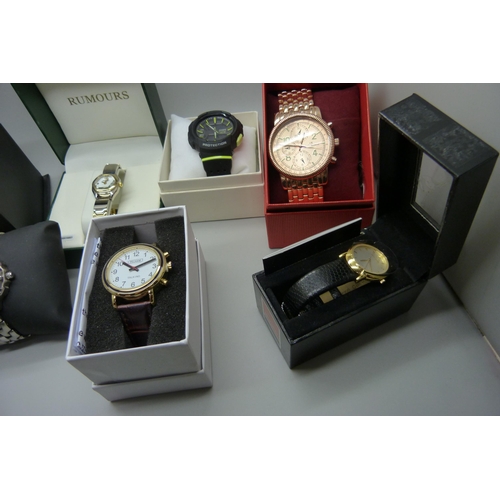 955 - A collection of fashion wristwatches including Ben Sherman, Pierre Cardin, Sekonda, Vogue, etc., mai... 