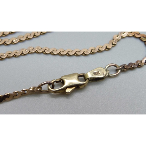 974 - A rose colour chain on a 14ct yellow gold clasp, total weight 8g, 62cm