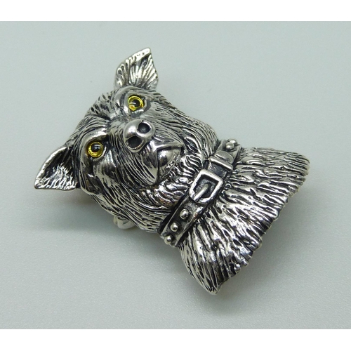 A silver dog's head brooch/pendant, marked sterling
