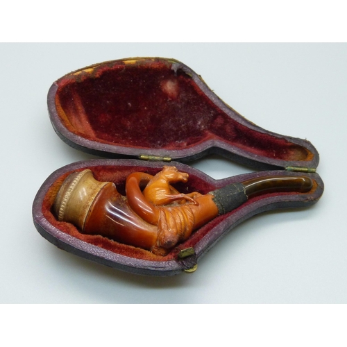 983 - A carved pipe with horse detail, cased, mouthpiece/stem a/f