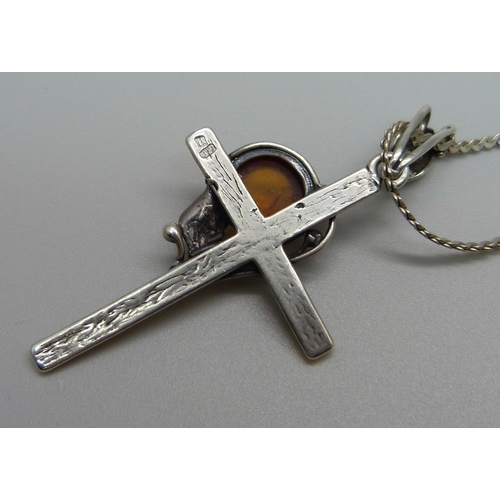 986 - A silver and amber cross pendant, a sterling brooch and an Alpaca Mexico brooch