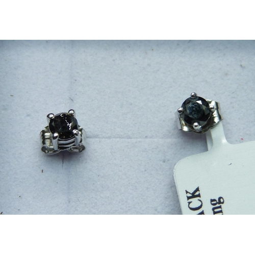 994 - A pair of 925 silver and black diamond ear studs, 0.33ct diamond weight