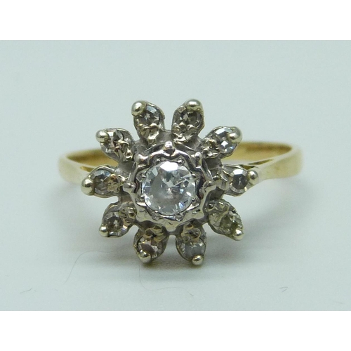 997 - An 18ct gold and diamond cluster ring, 3.1g, N