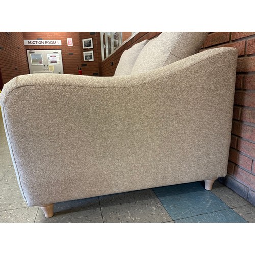 1412 - A Hattie Minco natural two seater sofa