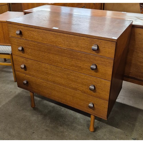 23 - An Avalon teak chest of drawers