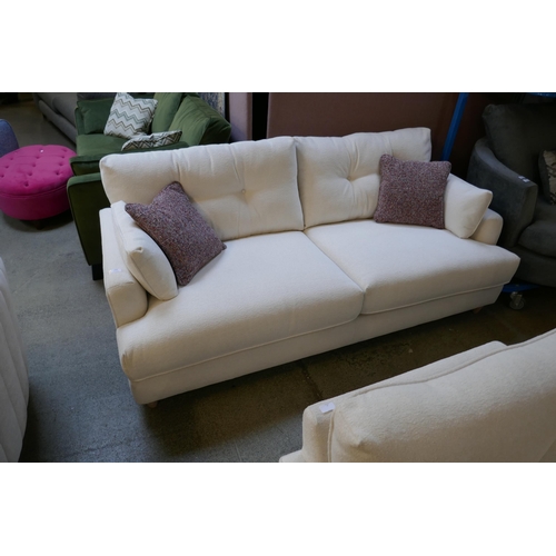 1546 - An Amor Brecon ivory four seater sofa