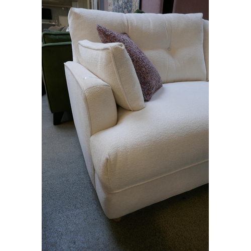 1546 - An Amor Brecon ivory four seater sofa