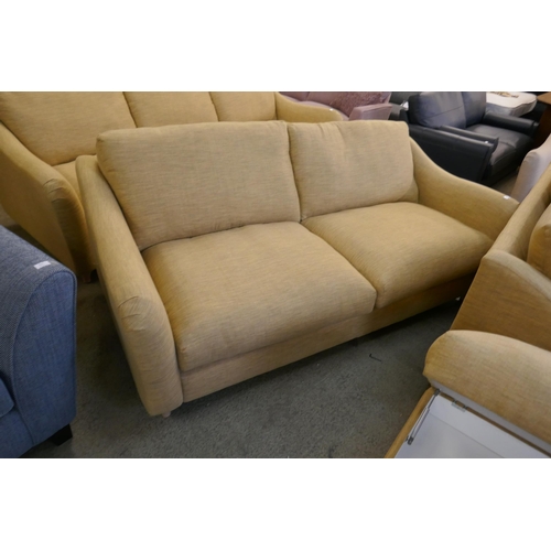 1554 - A Hattie Oslo ochre three seater sofa