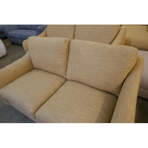 1555 - A Hattie Oslo ochre two seater sofa