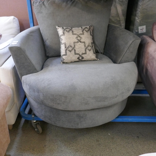 1558 - A grey upholstered swivel armchair