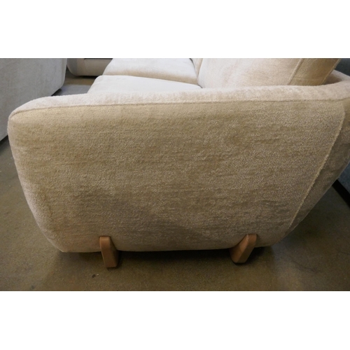 1561 - An Aspen Cecconi ivory four seater split sofa