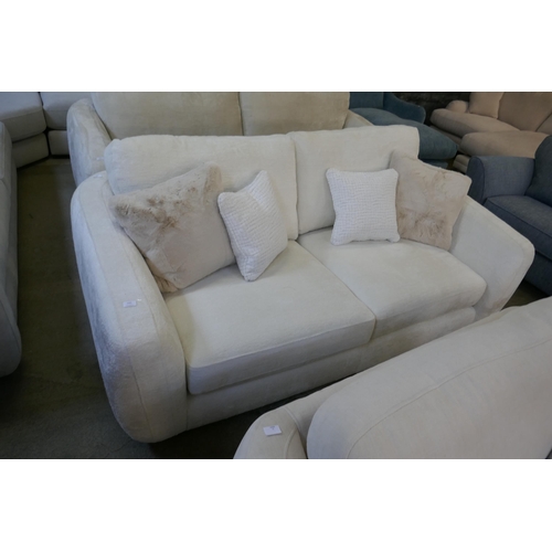 1562 - A Curated Aspen Cecconni chalk three seater sofa