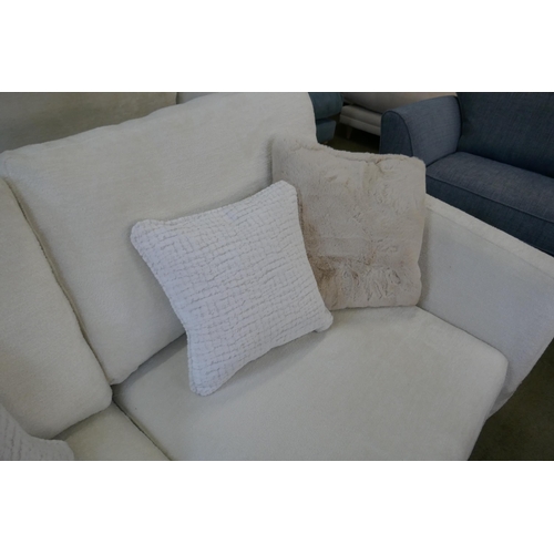 1562 - A Curated Aspen Cecconni chalk three seater sofa