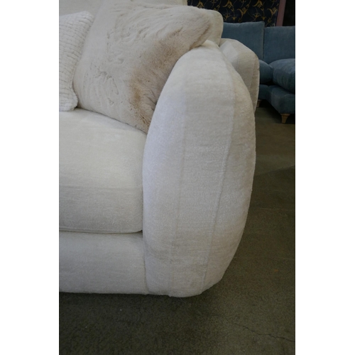 1562 - A Curated Aspen Cecconni chalk three seater sofa